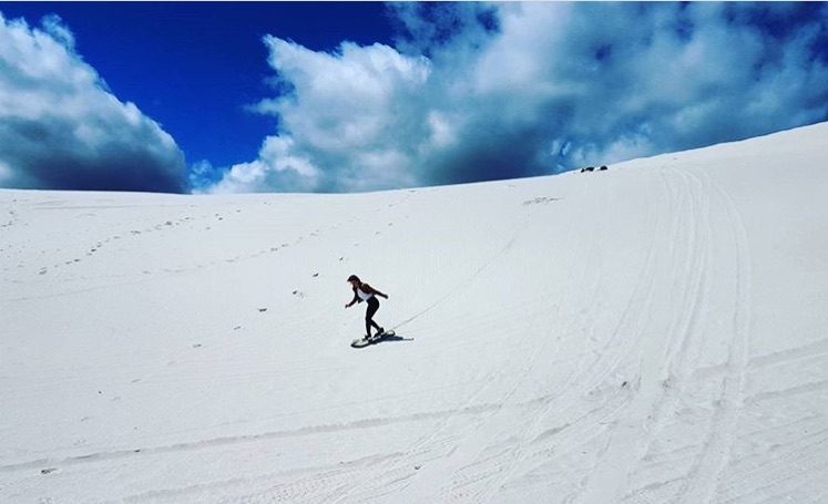 Fare sandboarding a Cape Town